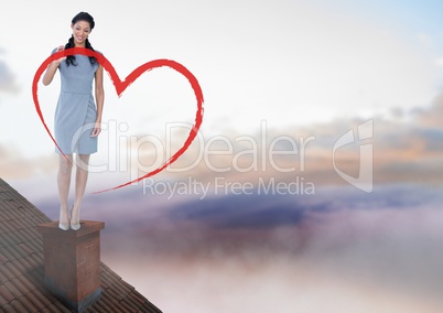 Heart drawing and Businesswoman standing on Roof with chimney and colorful sky