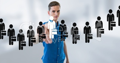 Businessman interacting and choosing a person from group of people icons