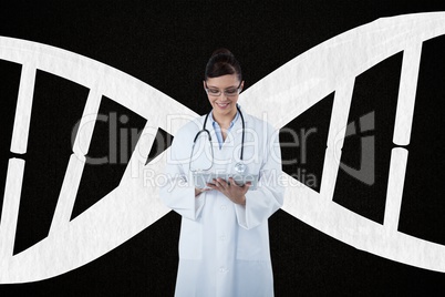 Doctor woman holding a tablet with DNA strand