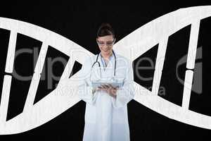 Doctor woman holding a tablet with DNA strand