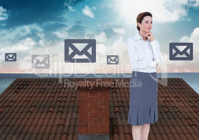 Email icons and Businesswoman standing on Roof with chimney and ocean landscape