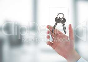 Business man holding a glass with keys icons