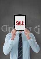 Business man holding a tablet with sale text