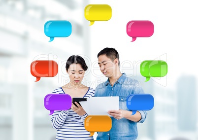 man and Woman on devices with shiny chat bubbles