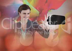 Woman touching and interacting with virtual reality headset with transition effect