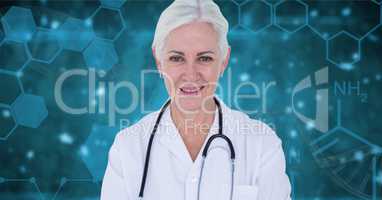 Doctor woman standing against blue background with medical interfaces