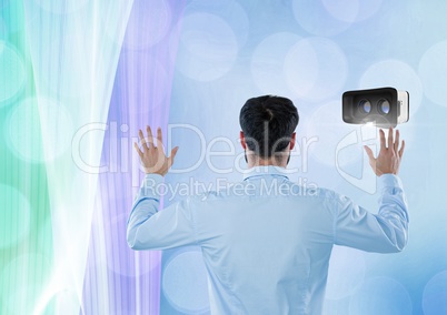 Man touching and interacting with virtual reality headset with transition effect