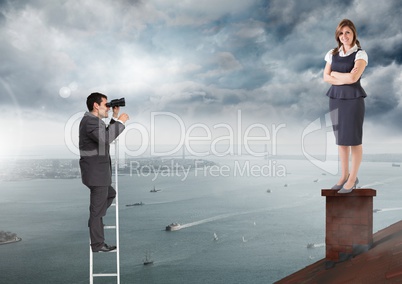 Businessman on ladder looking at Businesswoman standing on Roof with chimney and cloudy city port