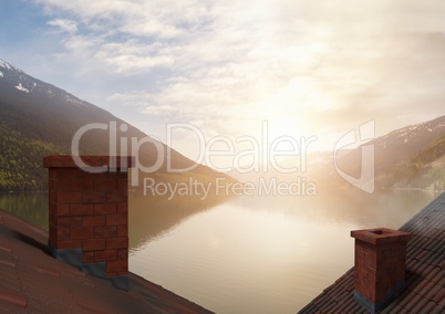 Roofs with chimney and lake mountain landscape