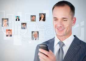 Man holding phone with Profile portraits of people contacts