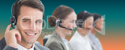 Composite image of business people with headsets using computers