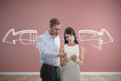 Composite image of business people looking at tablet