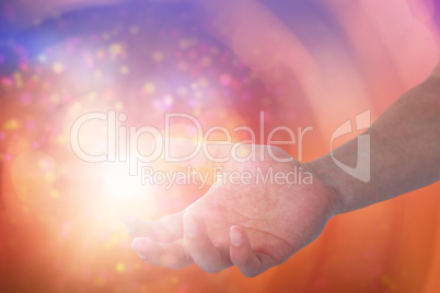 Composite image of hand of man pretending to hold an invisible object