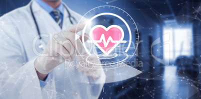 Composite image of doctor touching an digital screen