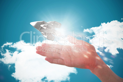 Composite image of cropped image of hand pretending to hold invisible object