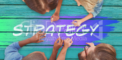 Composite image of business people writing with chalks