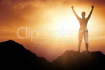 Composite image of cheerful woman with arms raised while standing