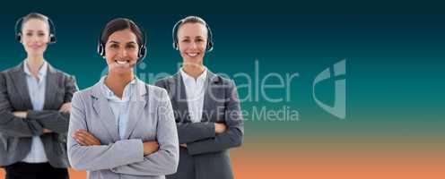 Composite image of business team wearing headsets and standing arms crossed