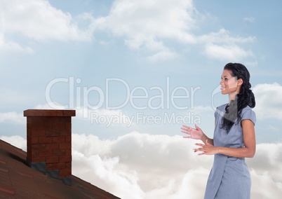 Businesswoman standing on Roof with chimney and blue sky