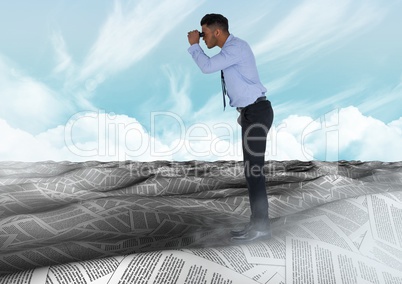 Businessman in sea of documents under sky clouds with binoculars