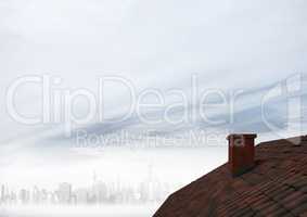 Roof with chimney and foggy sky