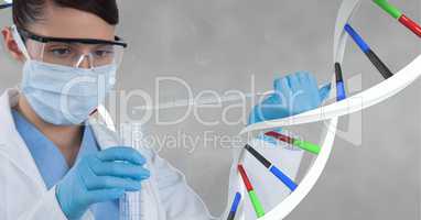 Doctor woman standing with 3D DNA strand against grey background
