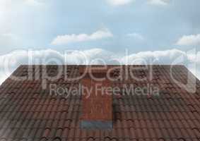 Roof with chimney and sky