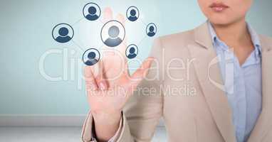 Businesswoman interacting and choosing a person from group of people icons