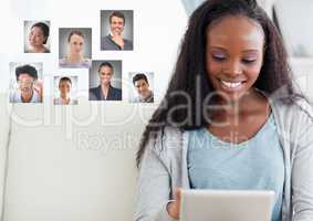 Woman holding tablet with Profile portraits of people contacts