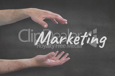 Hands interacting with marketing business text against grey background