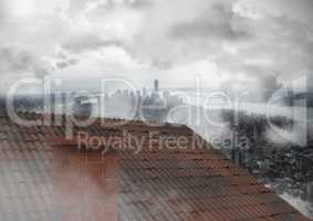 Roof with chimney and cloudy city