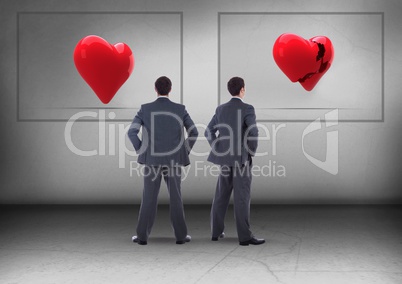 Broken heart or heart in frames with Businessman looking in opposite directions