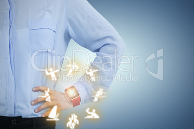 Composite image of businesswoman wearing smartwatch