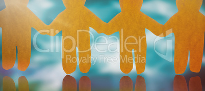 Composite image of 4 yellow paper person holding hands