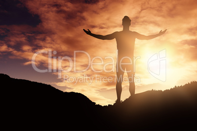 Composite image of athlete man standing with arms outstretched