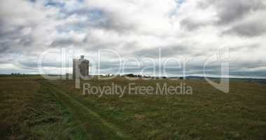 Scenic view of grassy landscape