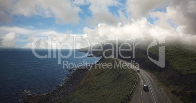 High angle view of road by sea against sky