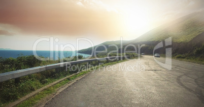 Road by sea on sunny day