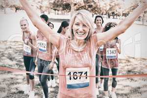 Happy winner of breast cancer marathon race