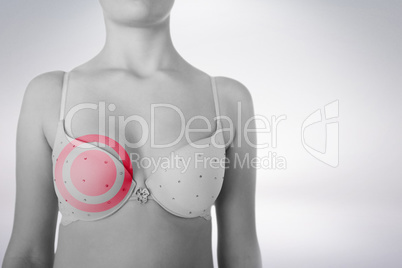 Composite image of mid section of woman wearing pink bra for breast cancer social issue