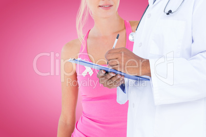 Composite image of midsection of male doctor writing on clipboard