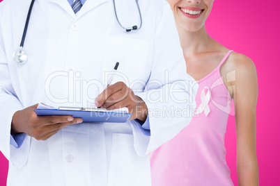 Composite image of midsection of male doctor writing on clipboard