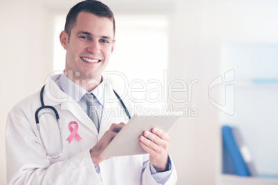 Composite image of breast cancer awareness ribbon