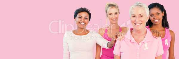 Composite image of portrait of women supporting breast cancer awareness
