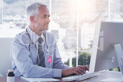 Composite image of breast cancer awareness ribbon