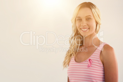 Portrait of smiling woman support breast cancer awareness