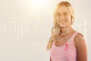 Portrait of smiling woman support breast cancer awareness