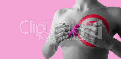 Composite image of nude woman with breast cancer ribbon