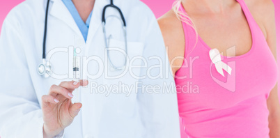 Composite image of doctor showing syringe to camera