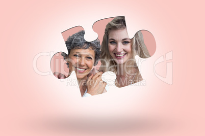 Composite image of women standing and holding hands on white background